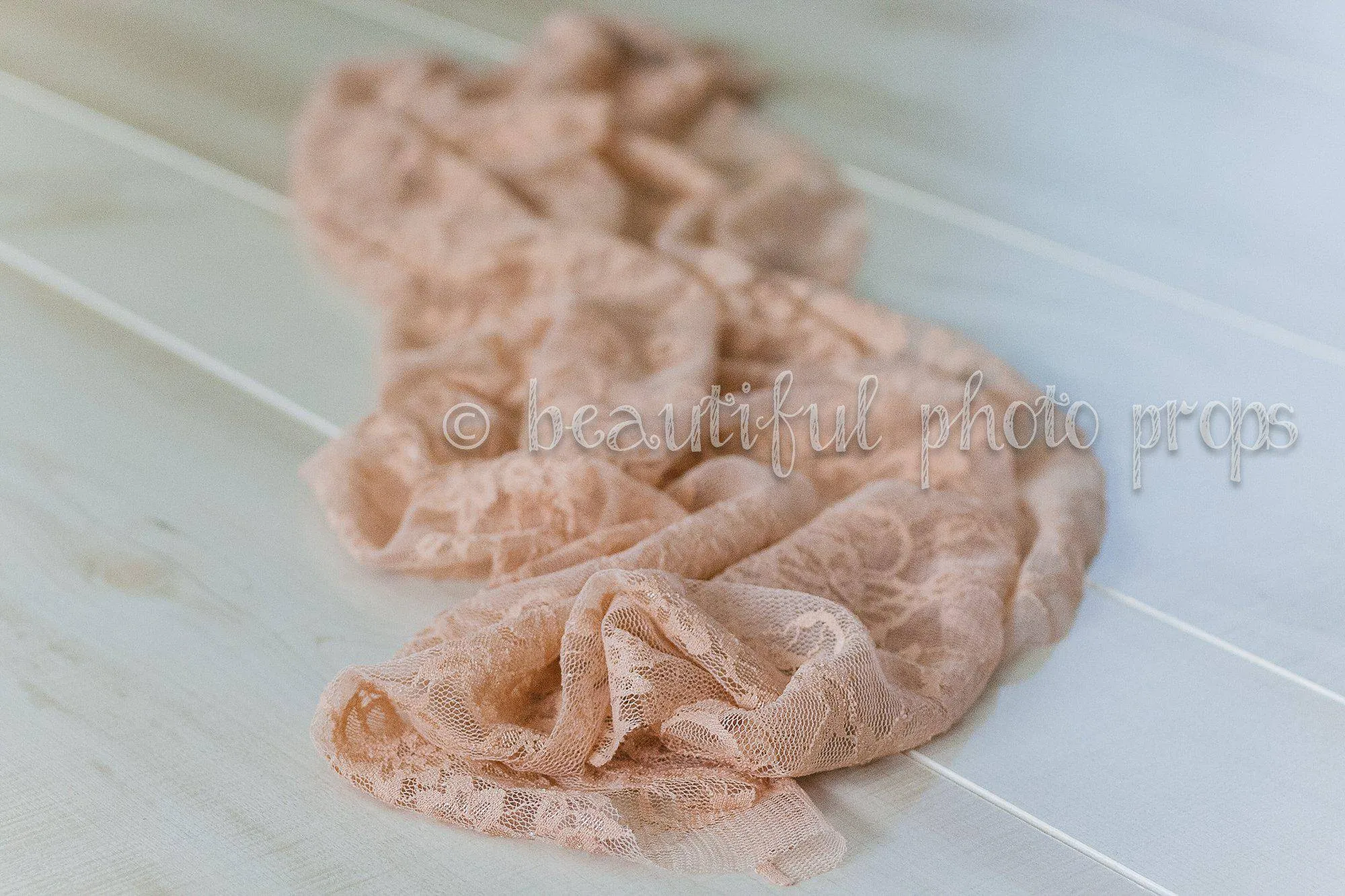 Stretch Lace Wrap Peach Tones   Baby